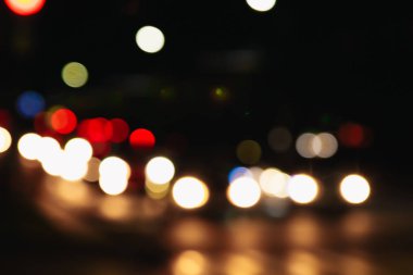 Noel ışıkları siyah bir arka plan bokeh bulanık. Işık bokeh soyut. Yeni yıl 2018, tatil, tatil kavramı.