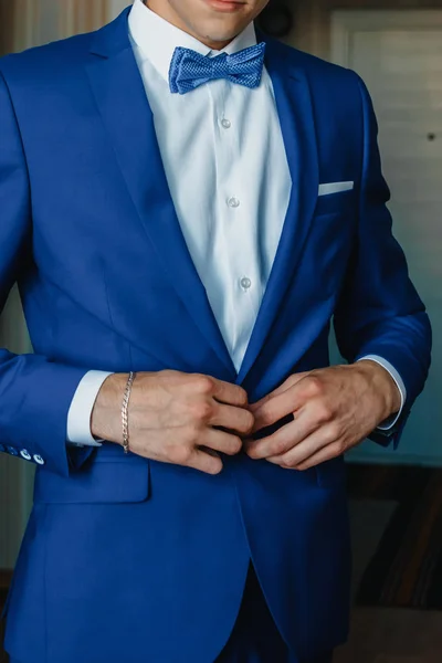 Man Buttoning Blue Jacket — Stock Photo, Image