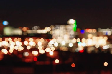 Noel ışıkları siyah bir arka plan bokeh bulanık. Işık bokeh soyut. Yeni yıl 2018, tatil, tatil kavramı.