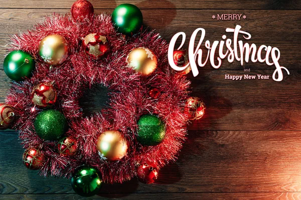 Inscription Merry Christmas Happy New Year Wreath Wooden Brown Table — Stock Photo, Image