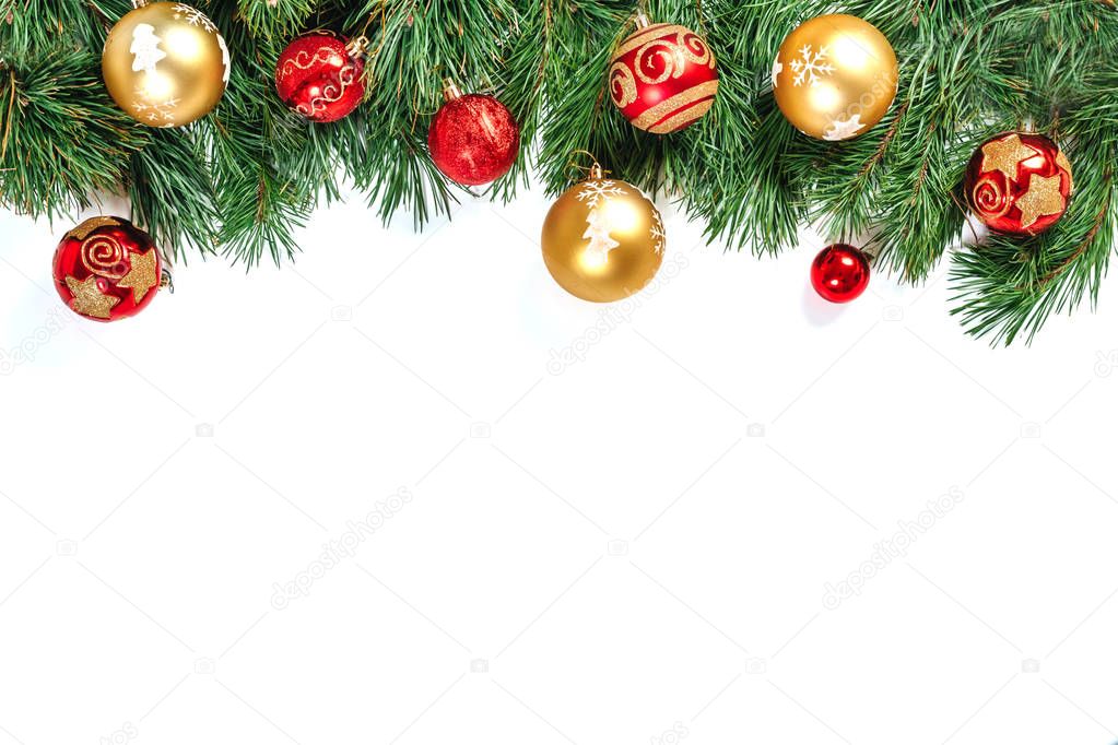 Christmas frame - tree branches with gold and red balls isolated on white background. Isolate.