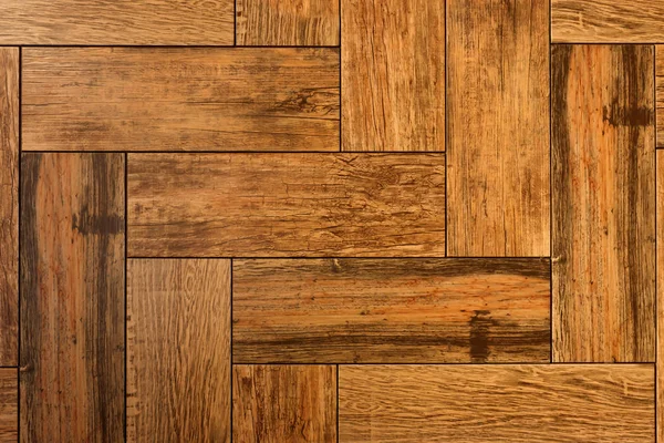 The texture is a wooden brown floor. brown wood, boards, parquet.