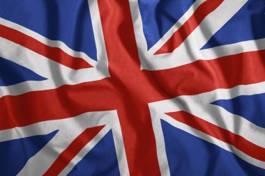 İngiliz bayrağı havada uçuyor. Büyük Britanya'nın renkli, ulusal bayrak. Vatanseverlik.