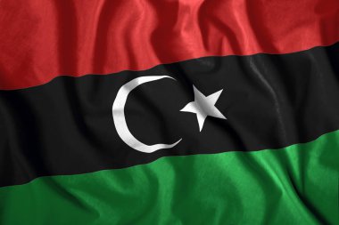Libya bayrağı havada uçar. Libya renkli ulusal bayrak. Vatanseverlik, vatansever sembolü.