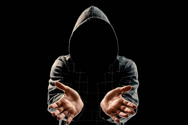 黒の背景 顔にフードの男のシルエットが表示されていない カメラで手のひらを示しています 犯罪者の概念を与え インコグニート 匿名性 — ストック写真