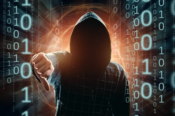 Young Hacker in the hood shows a finger down, hacker attack, a silhouette of a man, mixed media. The concept of a sudden attack, cryptography, data security.