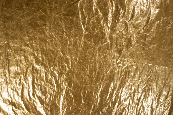 Textur aus Goldfolie, Nahaufnahme, Draufsicht — Stockfoto