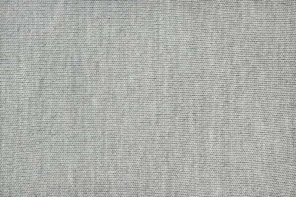 Texture di tessuto grigio lavorato a maglia, primo piano, vista dall'alto — Foto Stock