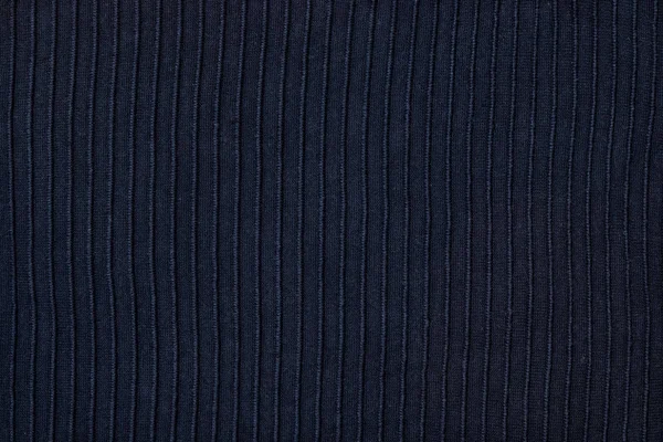 Texture of blue knitted fabric, close-up, top view — Stock Photo, Image
