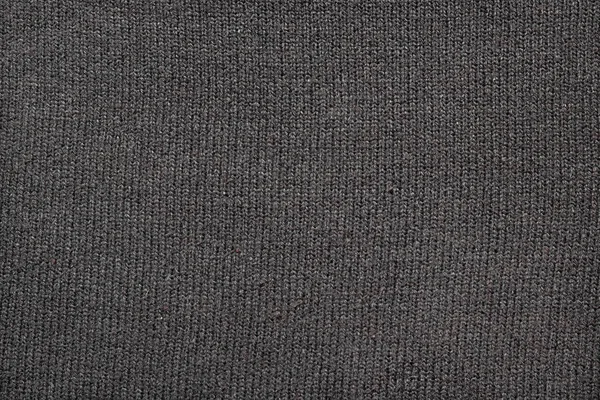 Текстура сірої в'язаної тканини, крупним планом, вид зверху — стокове фото