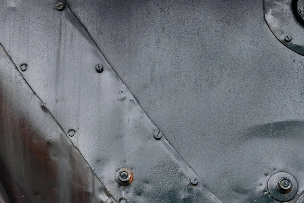 Textur der Metalloberfläche, Metall abgenutzter Hintergrund mit Nieten — Stockfoto