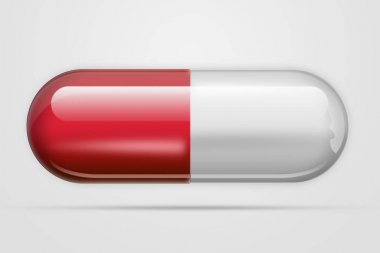 Beyaz arka plan üzerinde izole kırmızı renkteki kapsül şeklinde bir hap. İlaç, tedavi, tedavi kavramı.