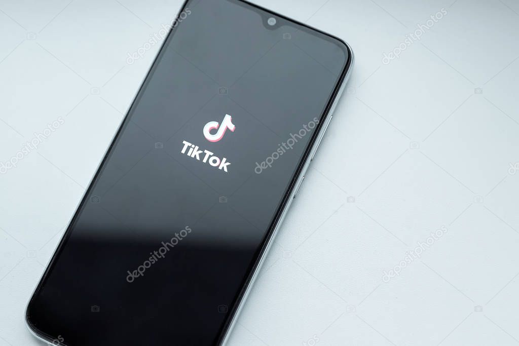 Brest, Belarus, January 31, 2020: Tik Tok application logo on the Xiaomi Redmi Note 8 smartphone screen close-up. Tick current application. Social network
