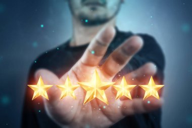 A young man shows 5 stars in the palm of his hand, assigning a new rating, rating services, a new level, business concept. mixed medium.