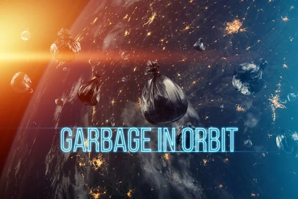 The inscription garbage in orbit. garbage in low Earth orbit, dangerous trash around the planet. Elements of this image furnished by NASA. — Stock Photo, Image