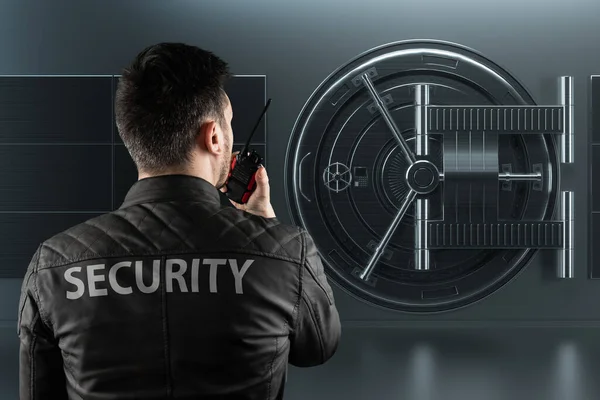 A guard with a walkie-talkie in the background Doors of a bank vault, a large safe, strong metal. The concept of protection of deposits, good protection of savings. Copy space, mixed media.