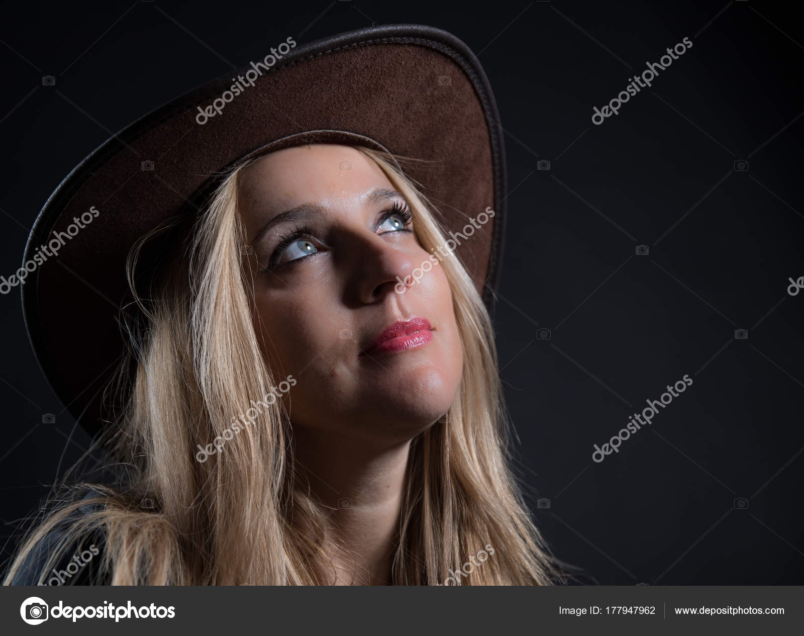 Low Light Model In Photographic Studio Stock Photo C Luisbaneres