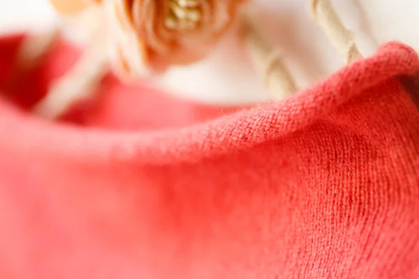 Beautiful, luxurious, knitted high neck sweater in red, autumn, winter, warm.
