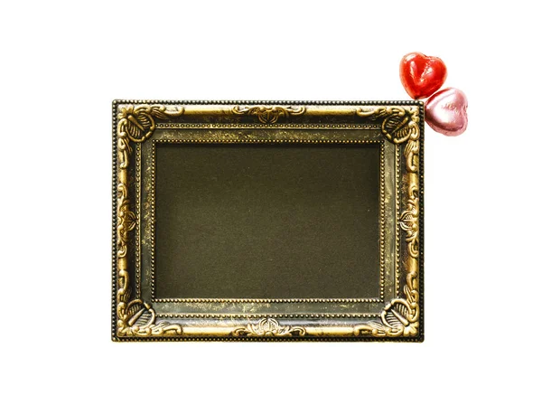 Valentijnsdag achtergrond met rode en roze chocolade hart vorm en gouden frame van bovenaanzicht. Kopiëren van ruimte — Stockfoto
