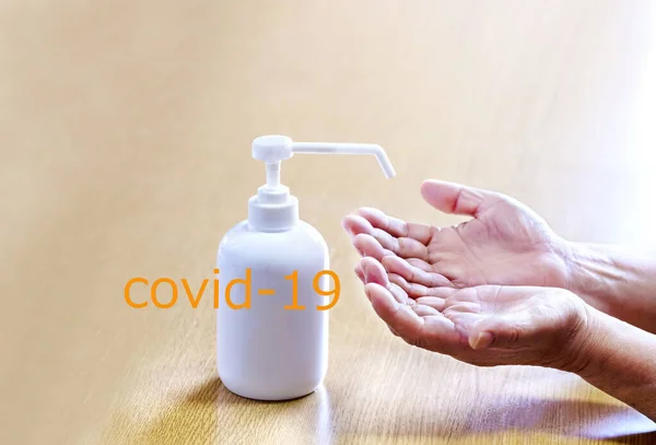 Senior Man Sprays Hands Antiseptic Plastic Spray Bottle Covid Hands — Stock Photo, Image