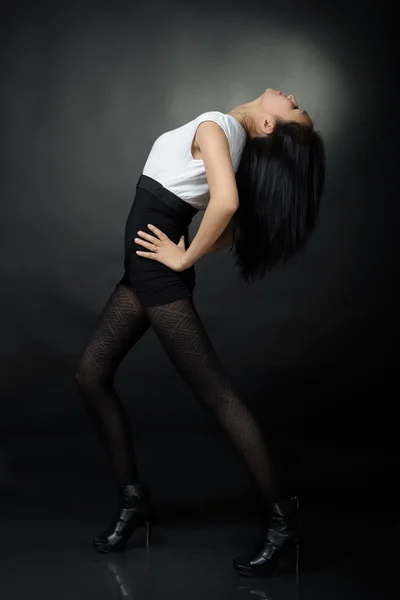 Asian girl in T-shirt and shorts — Stock Photo, Image