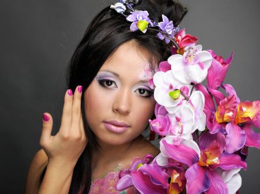 Portrait of asian girl with flowers