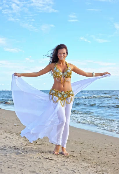 Gorgeous woman in white exotic dress — Stock Photo, Image