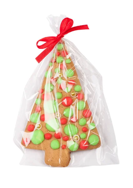 Christmas gingerbread tree cookie in transparent packing — Stock Photo, Image