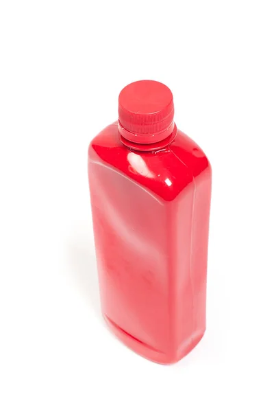 Bottiglia di plastica rossa — Foto Stock