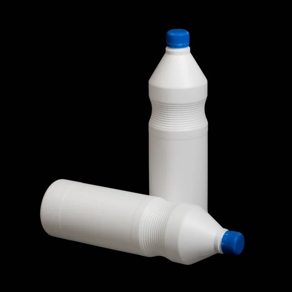 Due bottiglie di plastica bianca — Foto Stock
