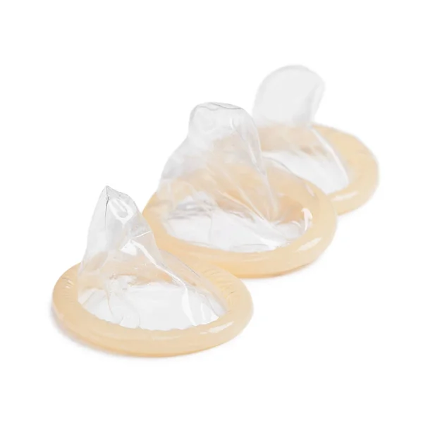 Kilka prezerwatywy na białym tle — Zdjęcie stockowe