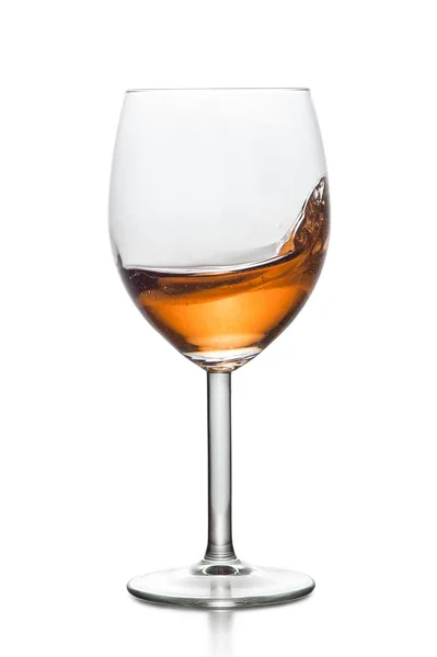 Bebida salpicante em vidro — Fotografia de Stock