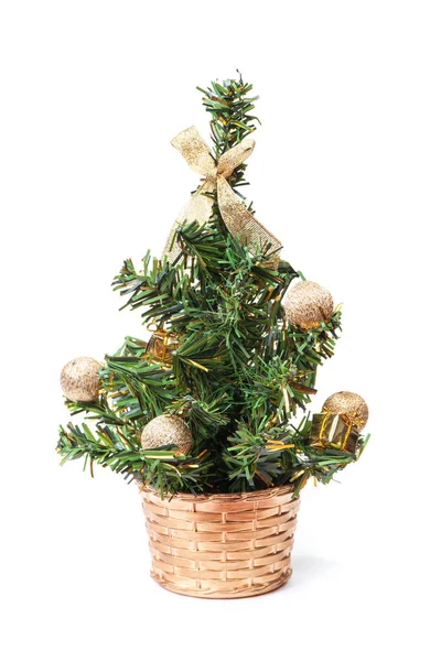 Malý umělý vánoční stromek — Stock fotografie