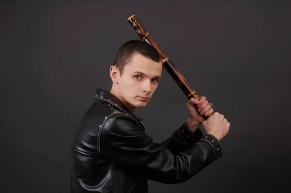 Dangerous man with a stick — Stock Photo, Image