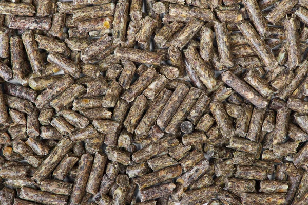 Купка сухих трав'яних гранул — стокове фото
