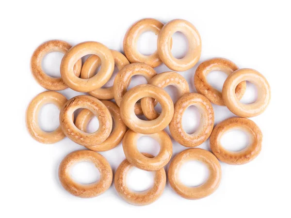 Egy Halom Száraz Bagel Fehér Alapon Elszigetelt Kenyérgyűrűk — Stock Fotó