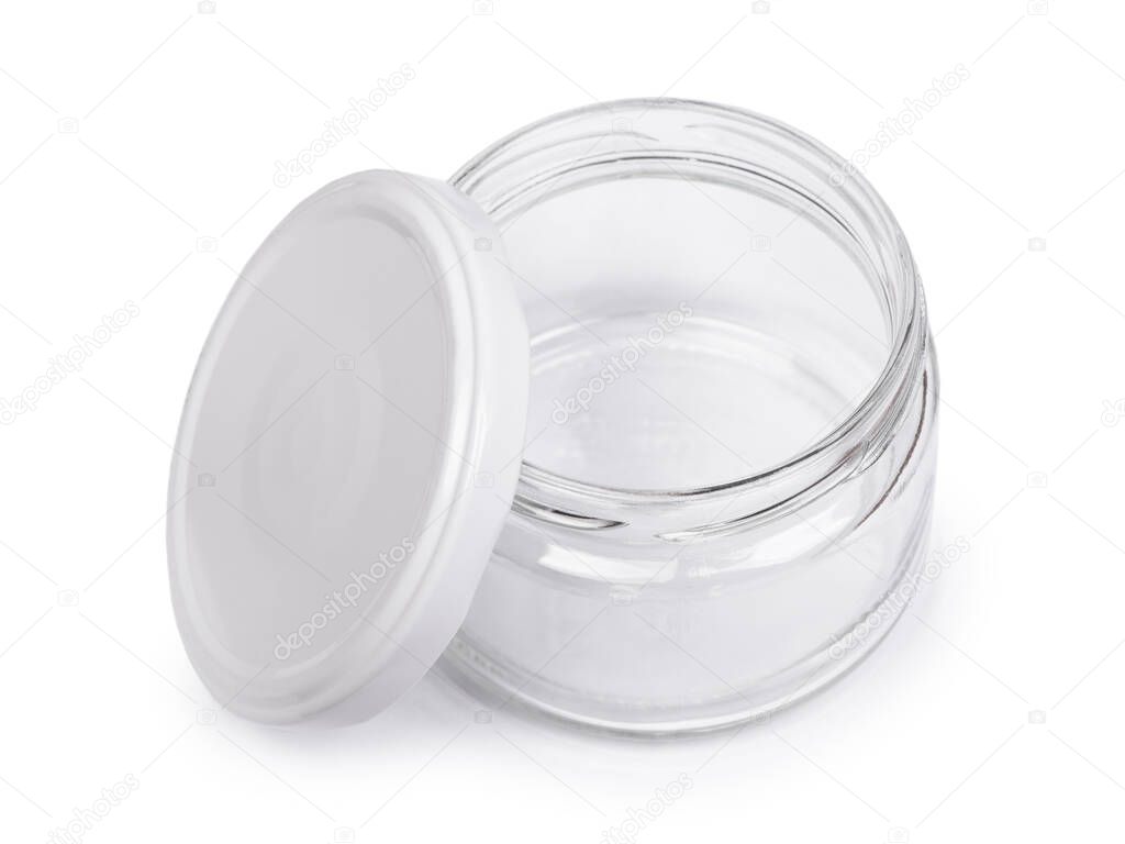 Small empty glass jar with a lid isolated on white background