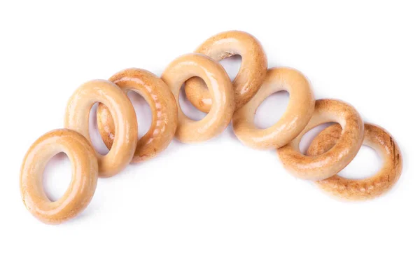 Heap Små Torra Bagels Bröd Ringar Isolerad Vit Bakgrund — Stockfoto