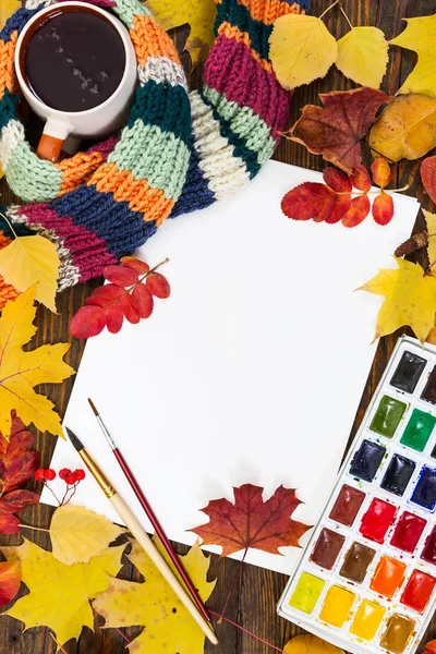 Workplace of artist. Sheet of paper, paints, brushes and autumn — Stock Photo, Image