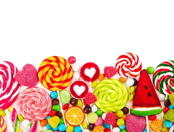 Színes édességet és nyalókák — Stock Fotó