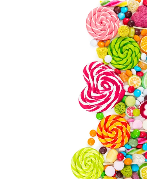 다채로운 사탕과 막대 사탕 상위 뷰. — 스톡 사진