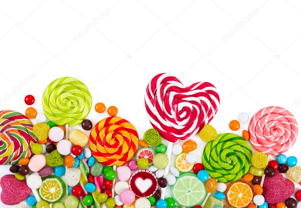 Colorful candies and lollipops. Top view.