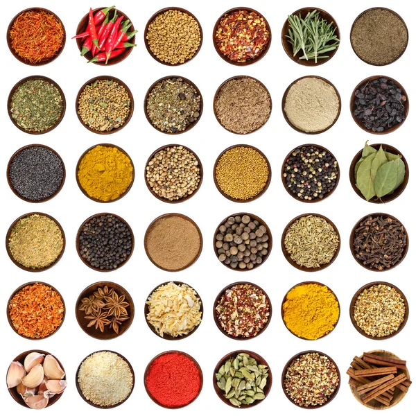 Set of different spices in wooden bowl. Top view. — Stock Photo, Image