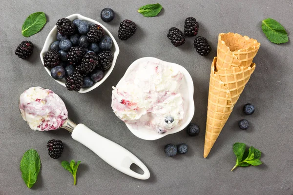Fruit ice cream with fresh blackberry and blueberry and ice crea