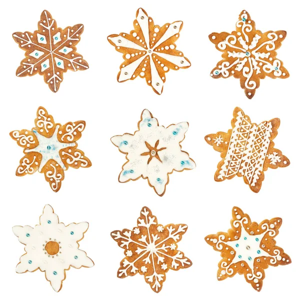 Set con galletas de jengibre de Navidad en forma de copo de nieve —  Fotos de Stock