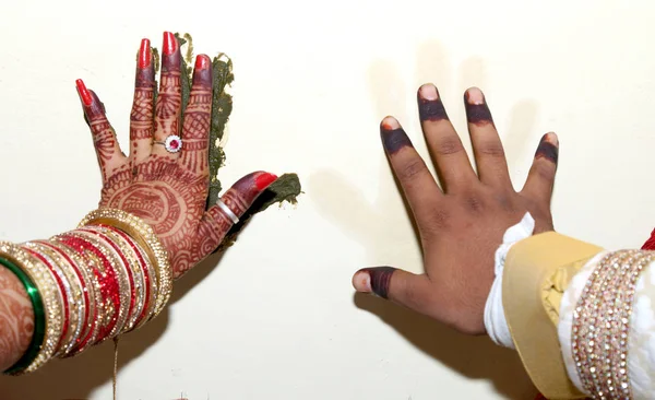 Indian Bride & Groom hand print to cloth ritual ceremony