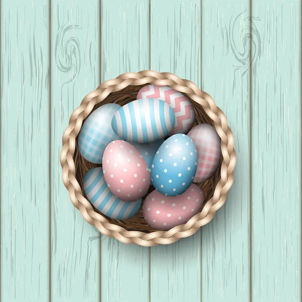 Basket with painted easter eggs on blue wooden background, illustration — Stock Vector