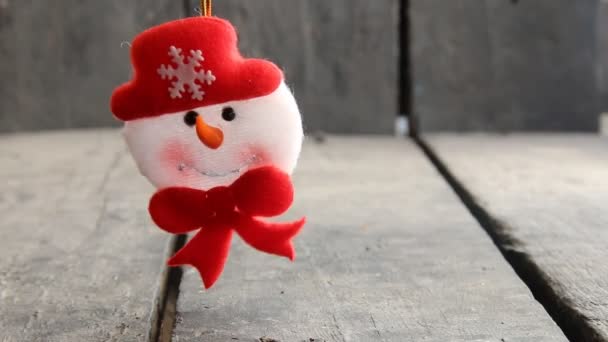 Snowman Toy on rustic wooden background. Christmas and New Year decoration — Stock Video