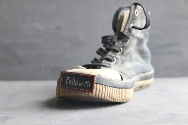 Follow me idea - label for social networks and Vintage Sneakers — Stock Photo, Image