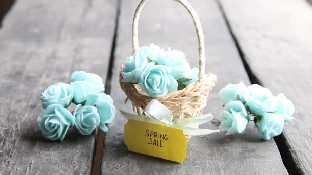 Spring sale - creative idea, tag and flowers in a small basket — Stock Video